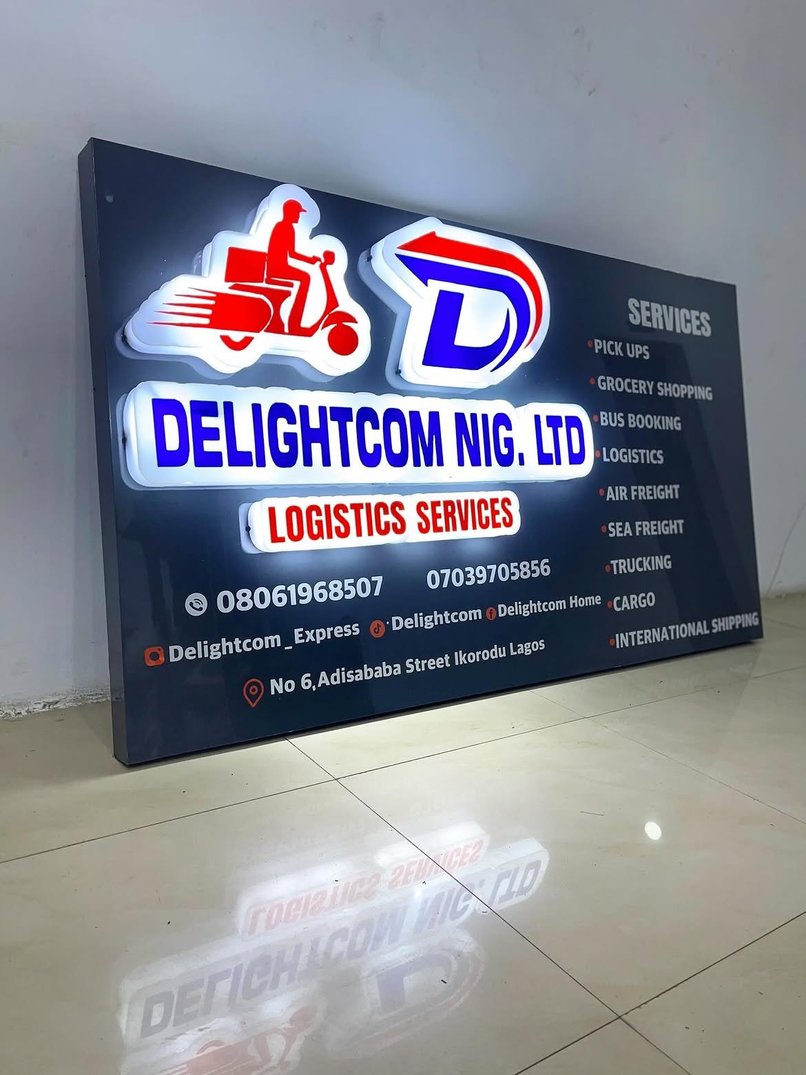 3D front-lit acrylic channel letters and illuminated delivery logo mounted on aluminum composite board in Industrial Area, Kampala, Uganda.