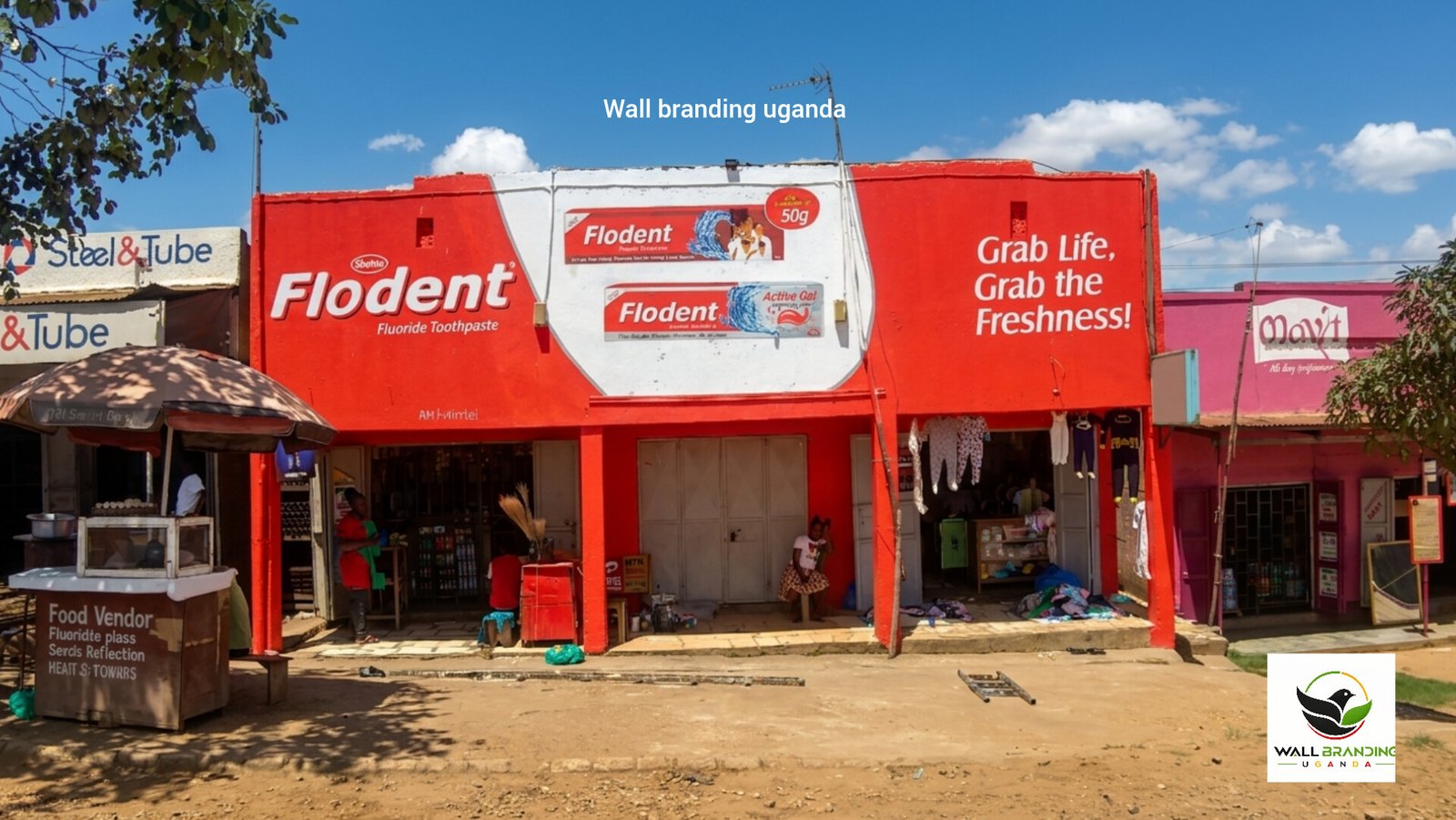 Commercial Outdoor Wall Branding & Retail Storefront Painting – Flodent Toothpaste, Mukono–Jinja Highway, Uganda